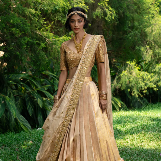 Gold Kanjeevaram Pattu Lehenga with Peach Tint